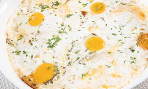 Cheese with Eggs in a Baking Dish